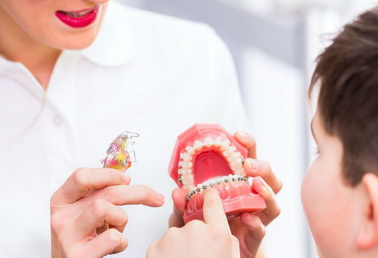 Исправили искривление зубов более 450 взрослых и детей